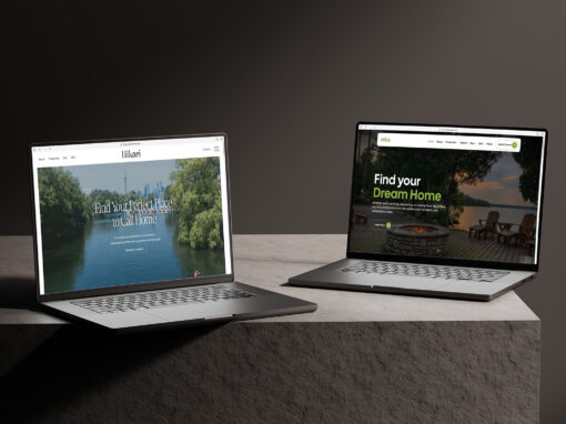 Two laptops displaying RealtyNinja's newest designs